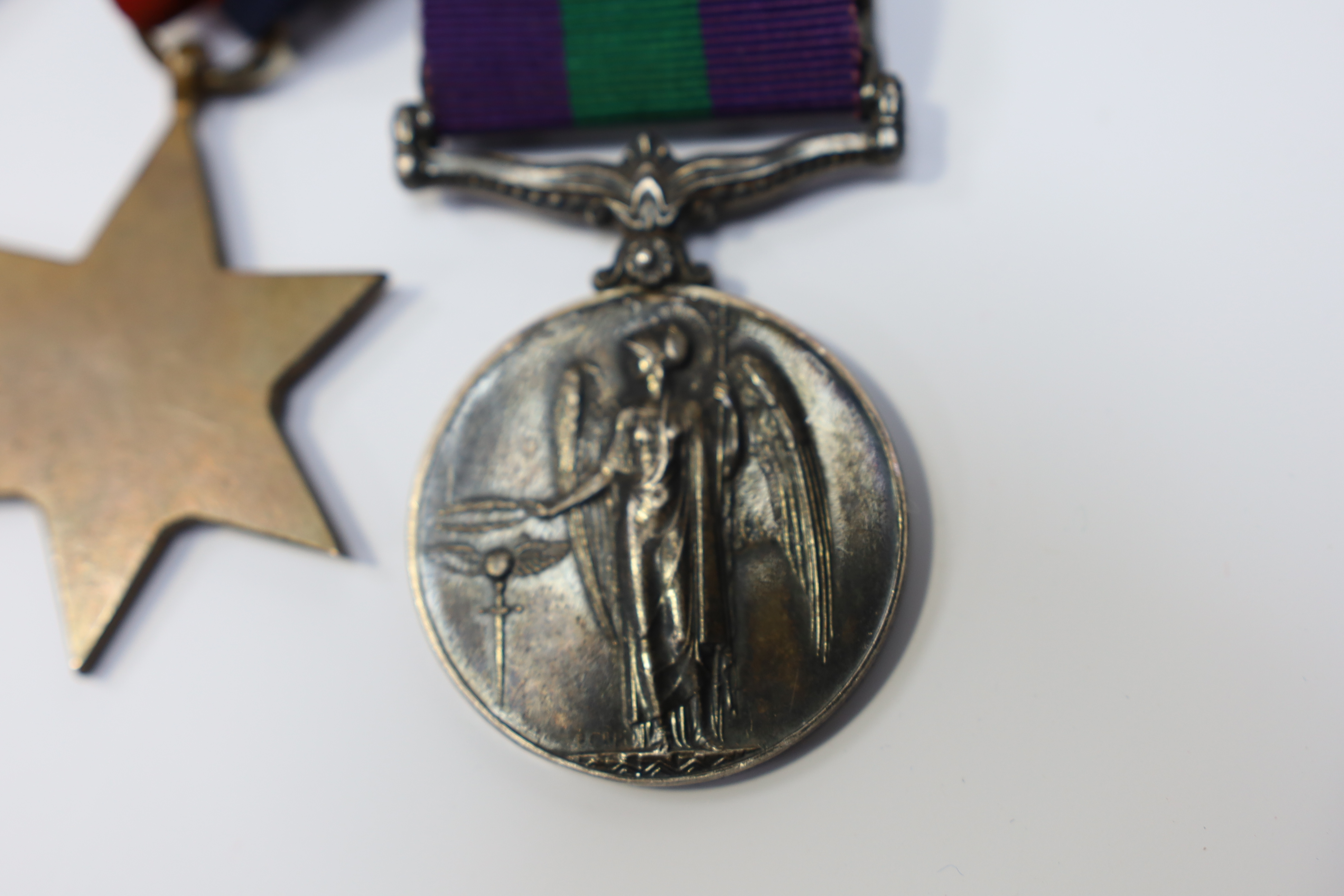 A WWII medal group awarded to Pte. J. Langridge S. Staff, comprising; a General Service Medal with two bars for Palestine and Palestine 1945-48, stamped to the edge with the recipient’s details, together with a 1939-45 S